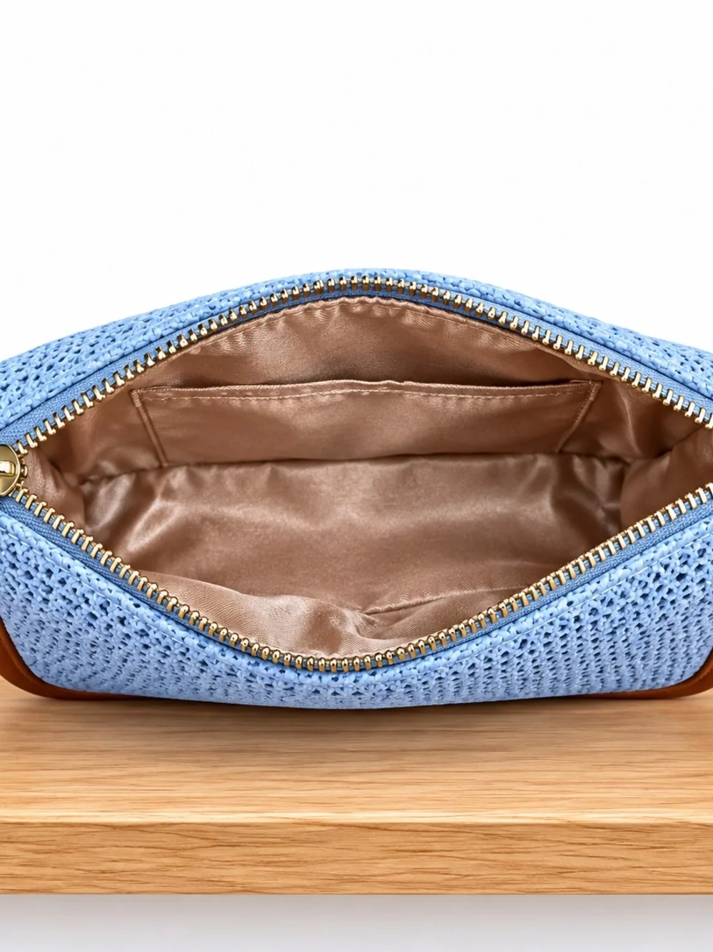Light Blue Woven Shoulder Bag with Brown Leather Trim and Floral Accent
